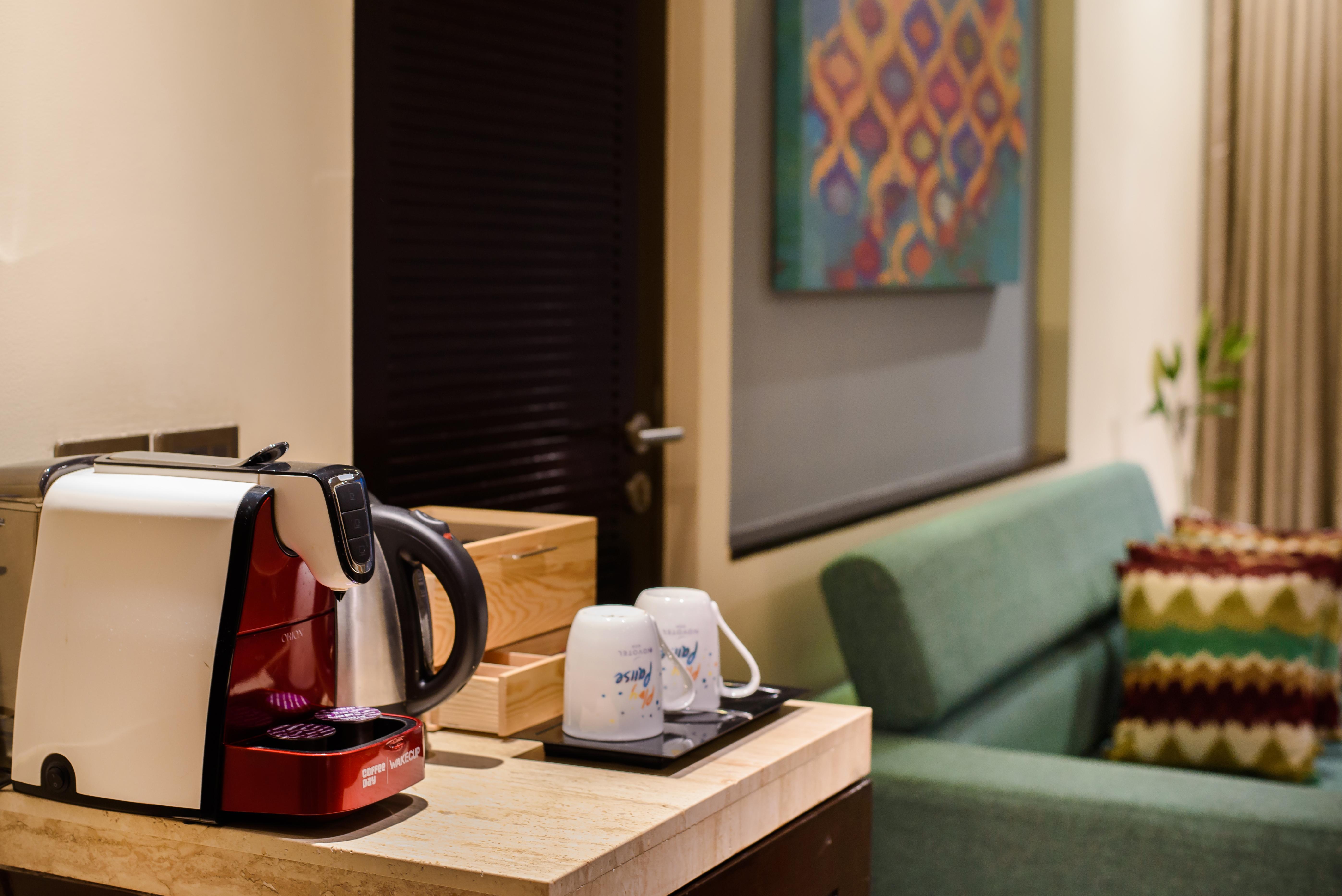 Novotel Goa Resort & Spa Candolim Luaran gambar A Nespresso machine in a hotel room
